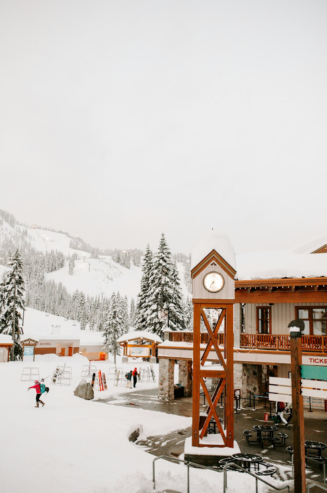 Alpine ski resort with crowded slopes and lodges